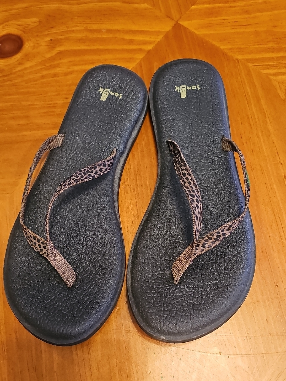 Sanuk Black Flip Flops with Brown Leopard-Print Straps